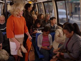 Jacqueline Voorhees' Orange Gradient Coat on Unbreakable Kimmy Schmidt