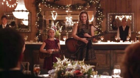 Maddie Conrad's Appliquéd lace and tulle dress on Nashville