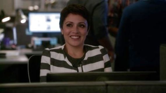 April Carver's Stripe Collarless Jacket on Chasing Life