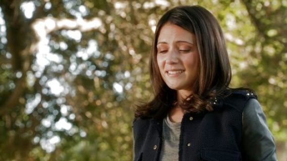 April Carver's Studded Boucle Jacket with Leather Sleeves on Chasing Life