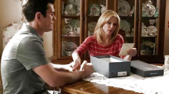Claire Dunphy's Stripe Sweater on Modern Family