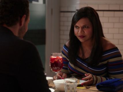 Dr. Mindy Lahiri's Off-the-shoulder striped sweater dress on The Mindy Project
