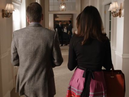 Emily Rhodes' Black Wrap Dress with Printed Skirt on Designated Survivor