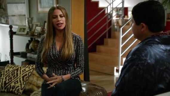 Gloria Pritchett's Abstract Print Surplice Wrap Top on Modern Family