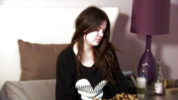 Khloe Kardashian's I am Love Berry L2L Oversized Raglan with Patches (in Black) on Kourtney and Kim Take Miami