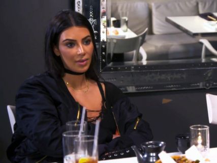 Kim Kardashian's Black Satin Bomber Jacket on Keeping Up With The Kardashians