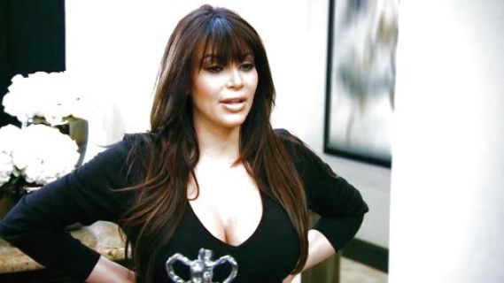 Kim Kardashian's V- neck top on Keeping Up With The Kardashians