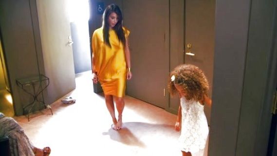 Kim Kardashian's Yellow Draped Sleeve Dress on Kourtney and Kim Take Miami
