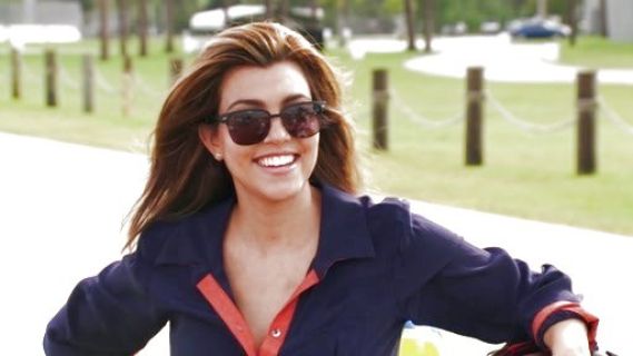 Kourtney Kardashian's Buena B Color Tie Front Shirt on Kourtney and Kim Take Miami