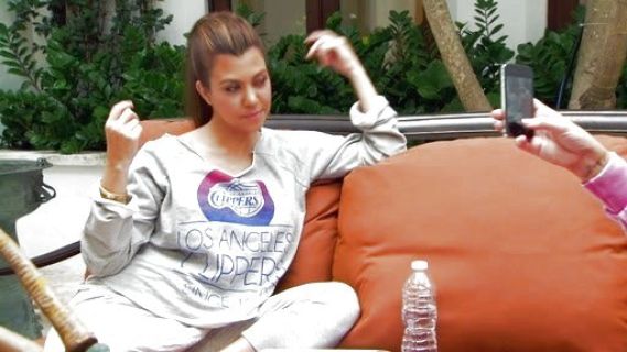 Kourtney Kardashian's La clippers andrews sweatshirt on Kourtney and Kim Take Miami