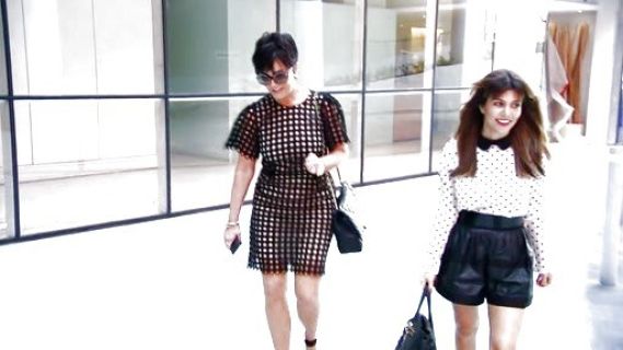 Kourtney Kardashian's Pleated leather mini skirt on Keeping Up With The Kardashians