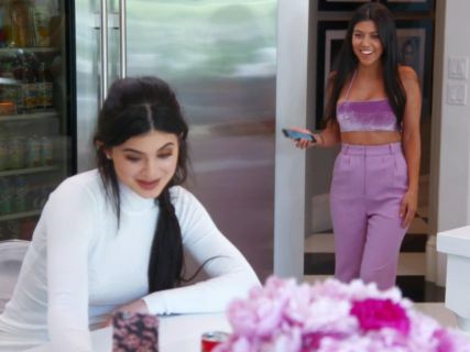 Kourtney Kardashian's Purple Velvet Crop Top and High Waist Pants on Keeping Up With The Kardashians