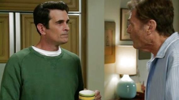 Phil Dunphy's Green Pullover on Modern Family