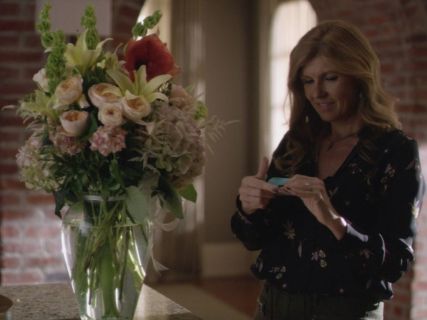 Rayna Jaymes's floral print blouse on Nashville