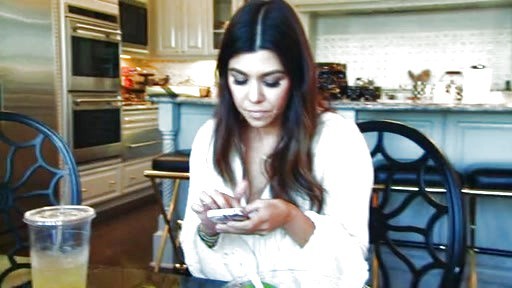 Kourtney Kardashian's Pintucked Embroidered Blouse on Keeping Up With The Kardashians