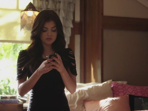 Aria Montgomery's Looped Sleeve Top on Pretty Little Liars