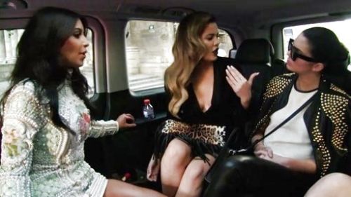 Khloe Kardashian's Leopard print pony hair fringe clutch on Keeping Up With The Kardashians