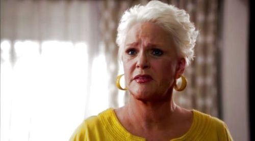 Madeline Westen's Yellow plastic hoop earrings on Burn Notice