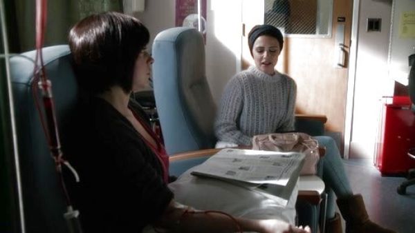 April Carver's 'Stage' mohair open knit sweater on Chasing Life