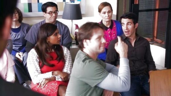 Dr. Mindy Lahiri's Aquilina B Silk Button-Front Blouse on The Mindy Project