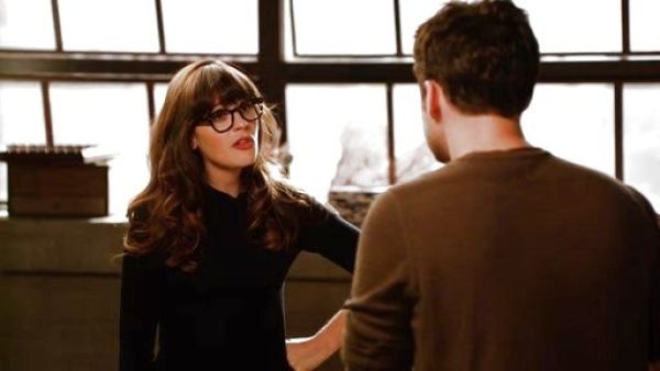 Jess Day's abree bow-neck sweeter, black on New Girl