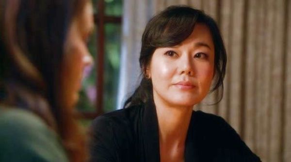 Karen Kim's black stud earrings on Mistresses