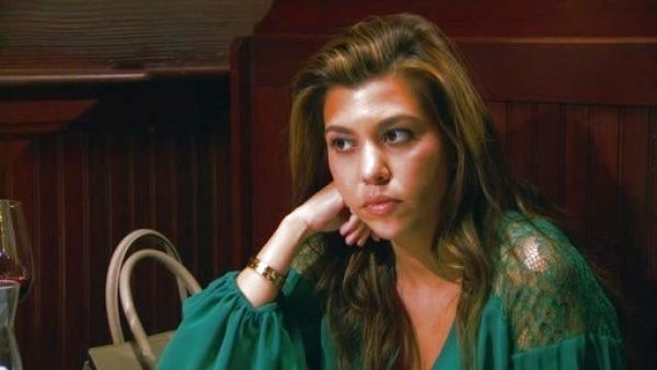 Kourtney Kardashian's green lace blouse on Kourtney and Kim Take Miami