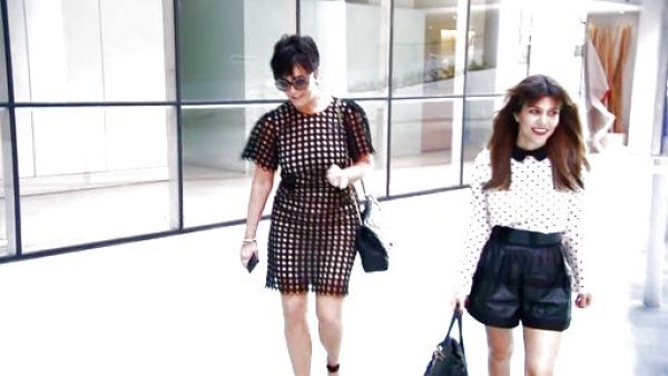 Kourtney Kardashian's Pleated leather mini skirt on Keeping Up With The Kardashians