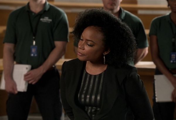 Miranda Shaw's Roland Striped Faux-Leather Peplum Top, Black on Quantico