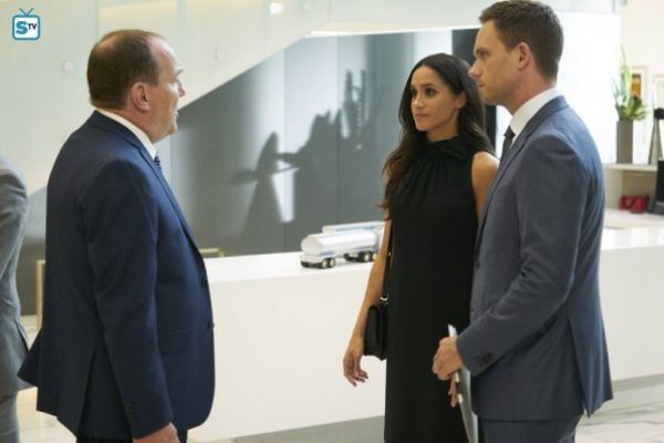 Rachel Zane's bow-neck dress on Suits