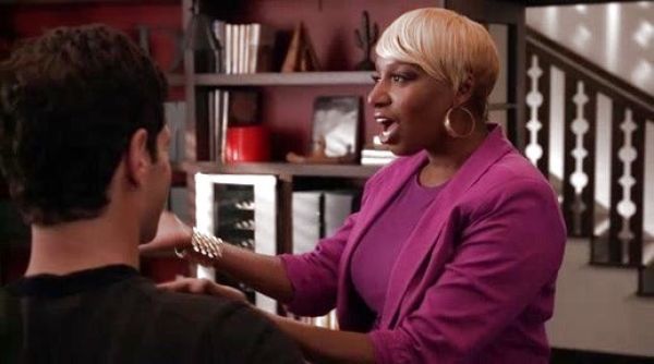 Rocky's gold hoop earrings on The New Normal